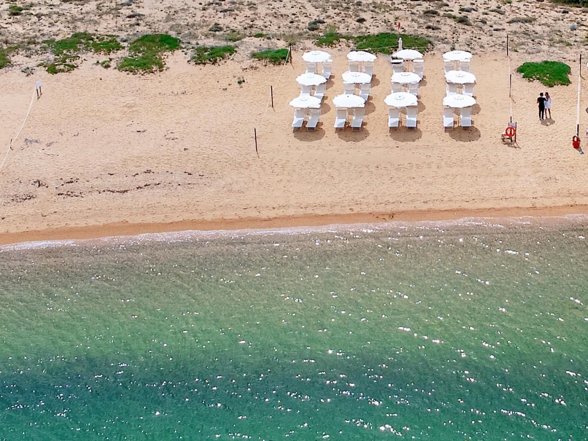 Hotel Pedra Santa Baja Sardinia Esterno foto