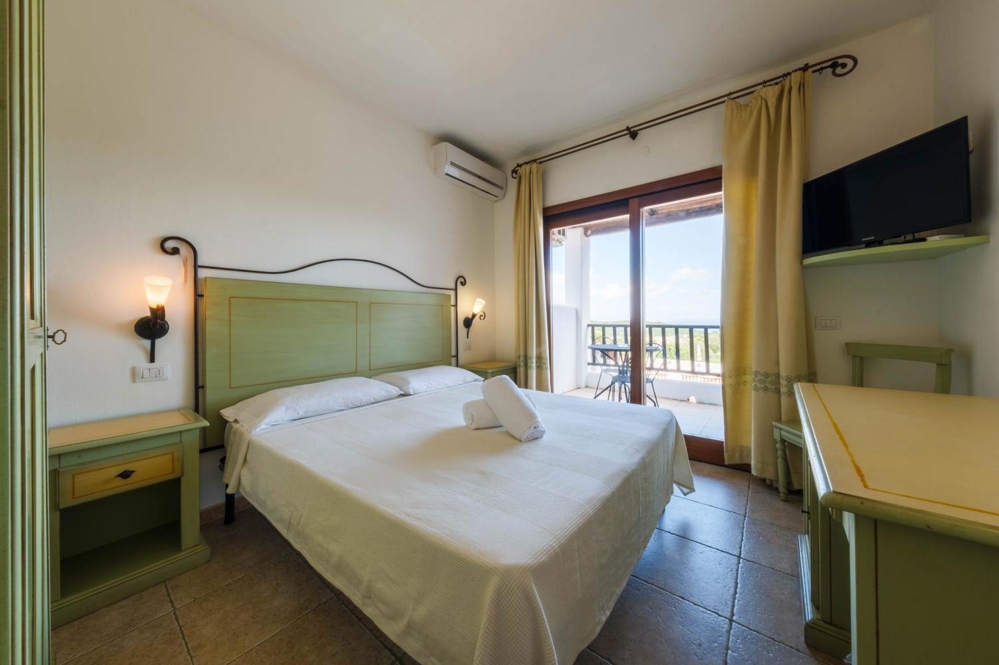 Hotel Pedra Santa Baja Sardinia Esterno foto